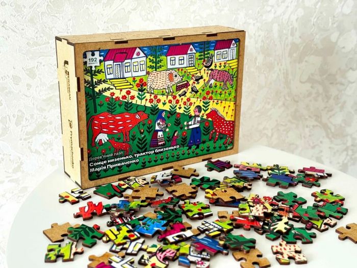 Пазл дерев`яний UkrainianPuzzles Сонце низенько, трактор близенько Марія Примаченко